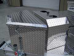 Barbecue grill with storage box and propane cover