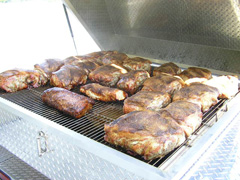 Trailer Grill Full of Boston Butts