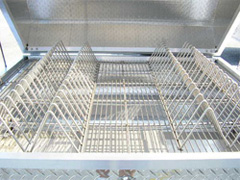 Four rib racks in barbecue trailer 